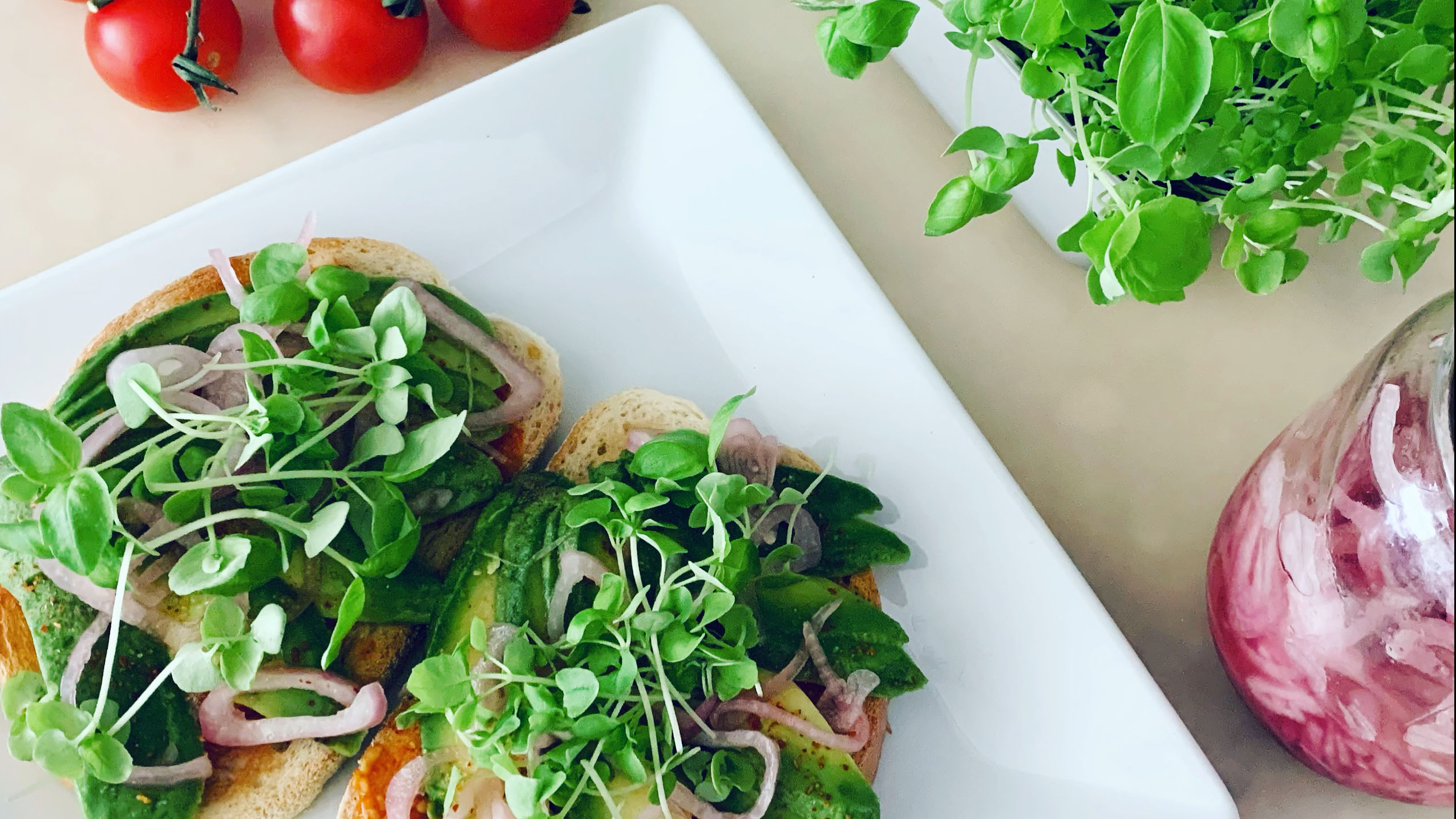 Avocado Toast with Roasted Garlic Tomatoes and Pickled Shallots